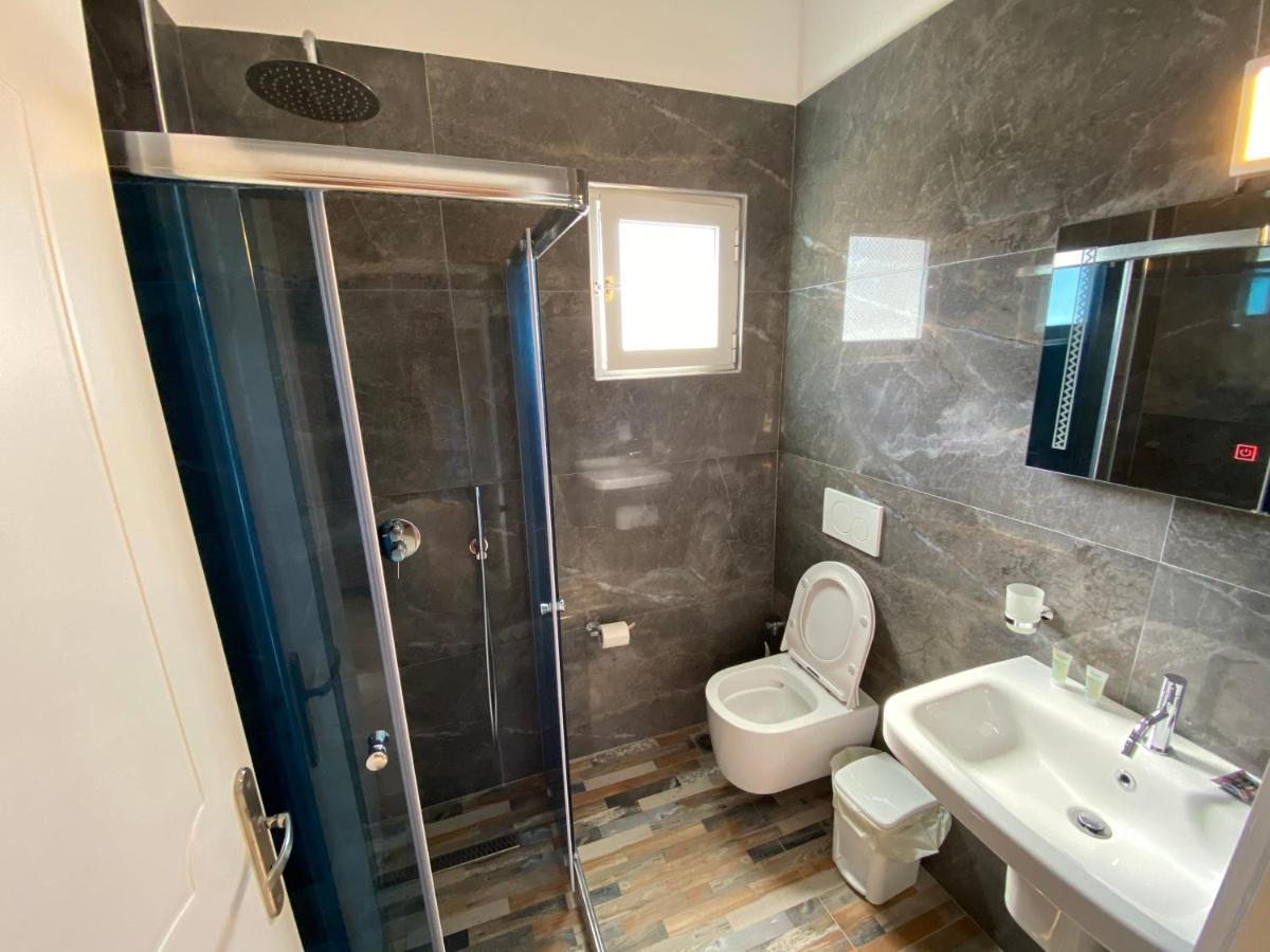 Karos Hotel Llaman Himare Bagian luar foto