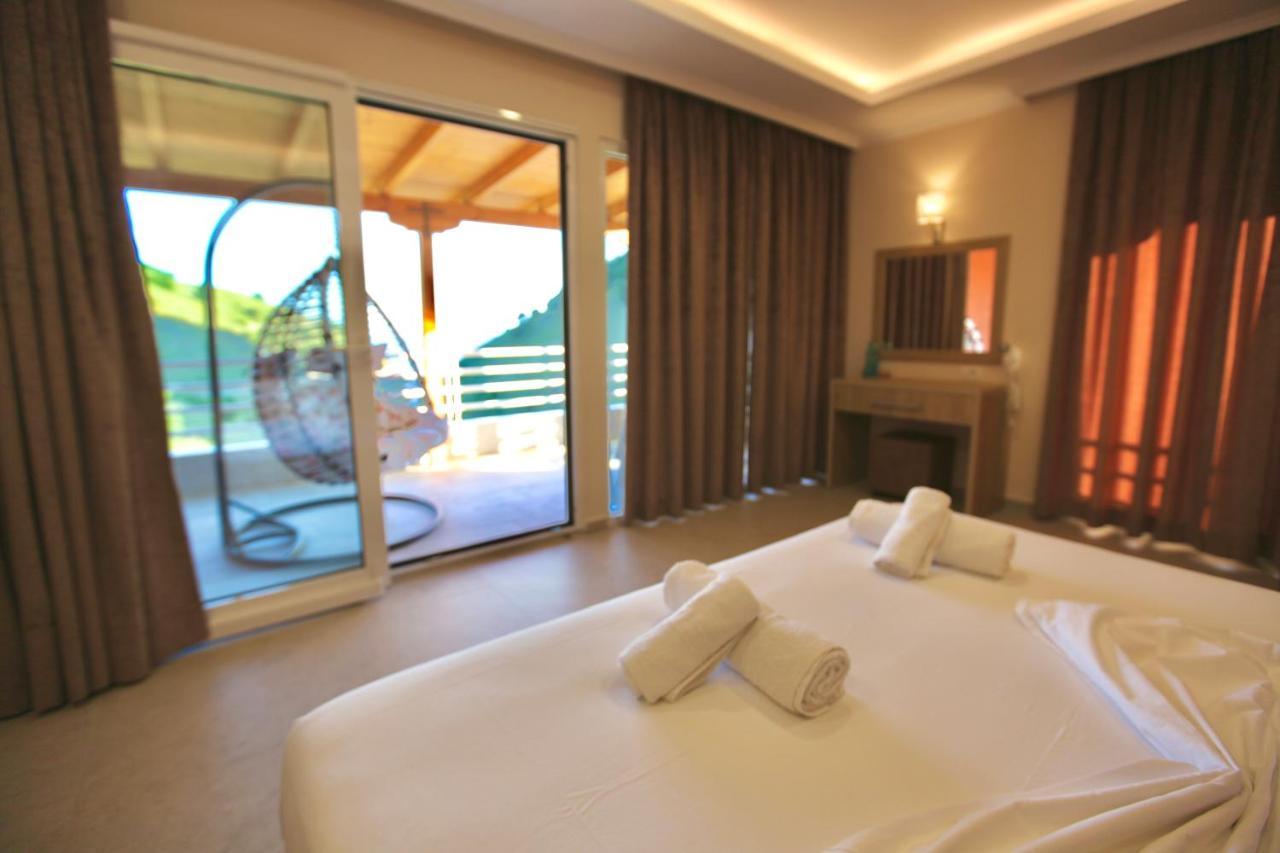 Karos Hotel Llaman Himare Bagian luar foto