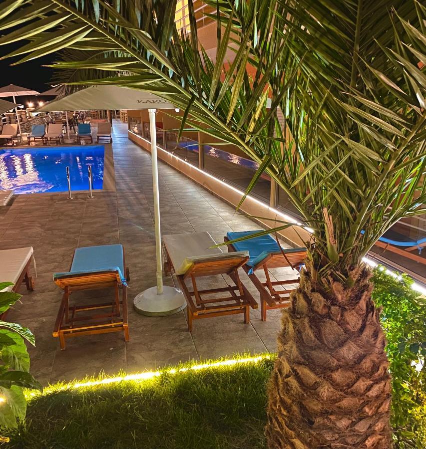 Karos Hotel Llaman Himare Bagian luar foto