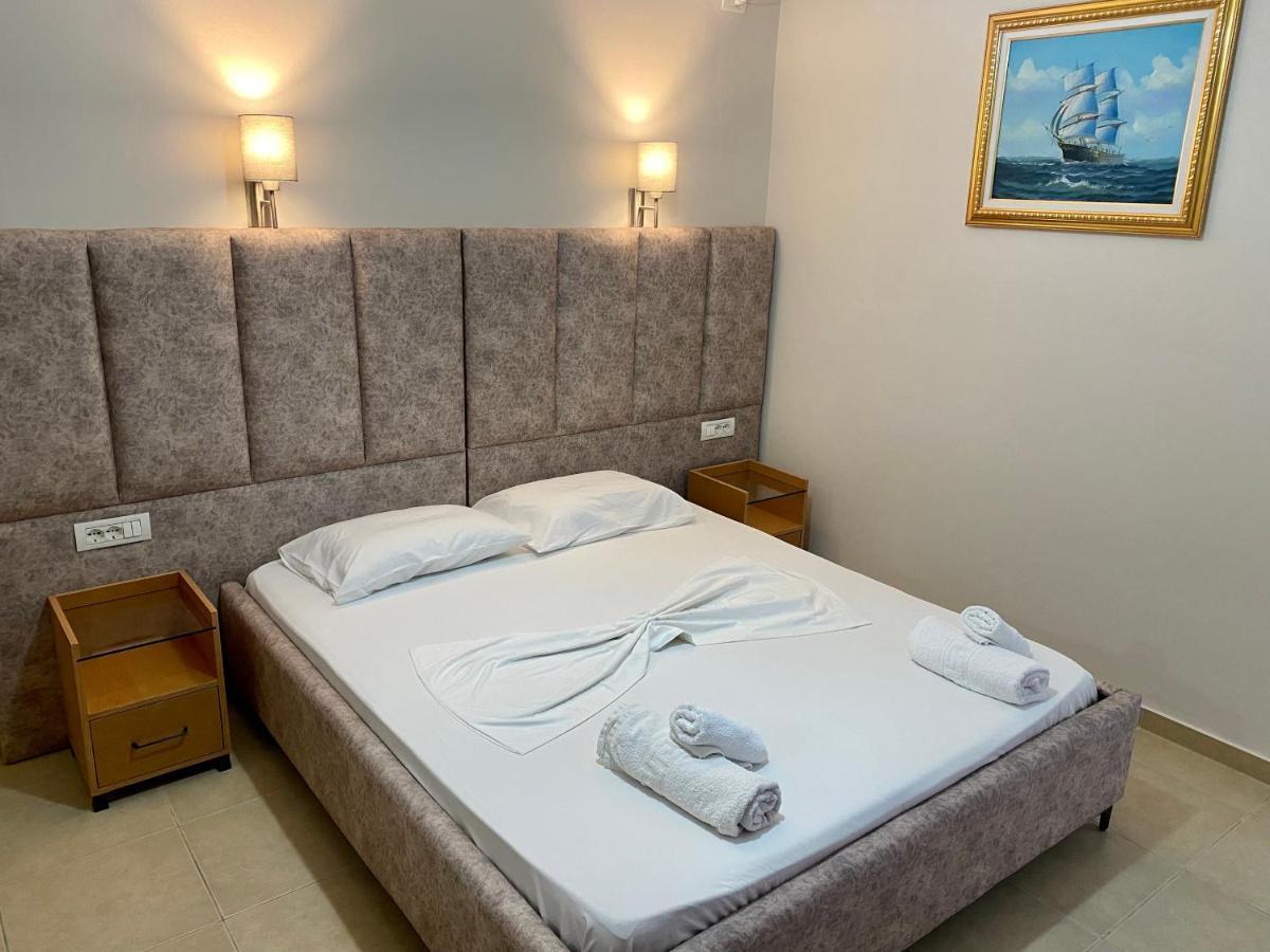 Karos Hotel Llaman Himare Bagian luar foto