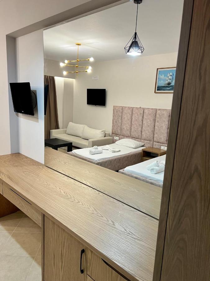 Karos Hotel Llaman Himare Bagian luar foto
