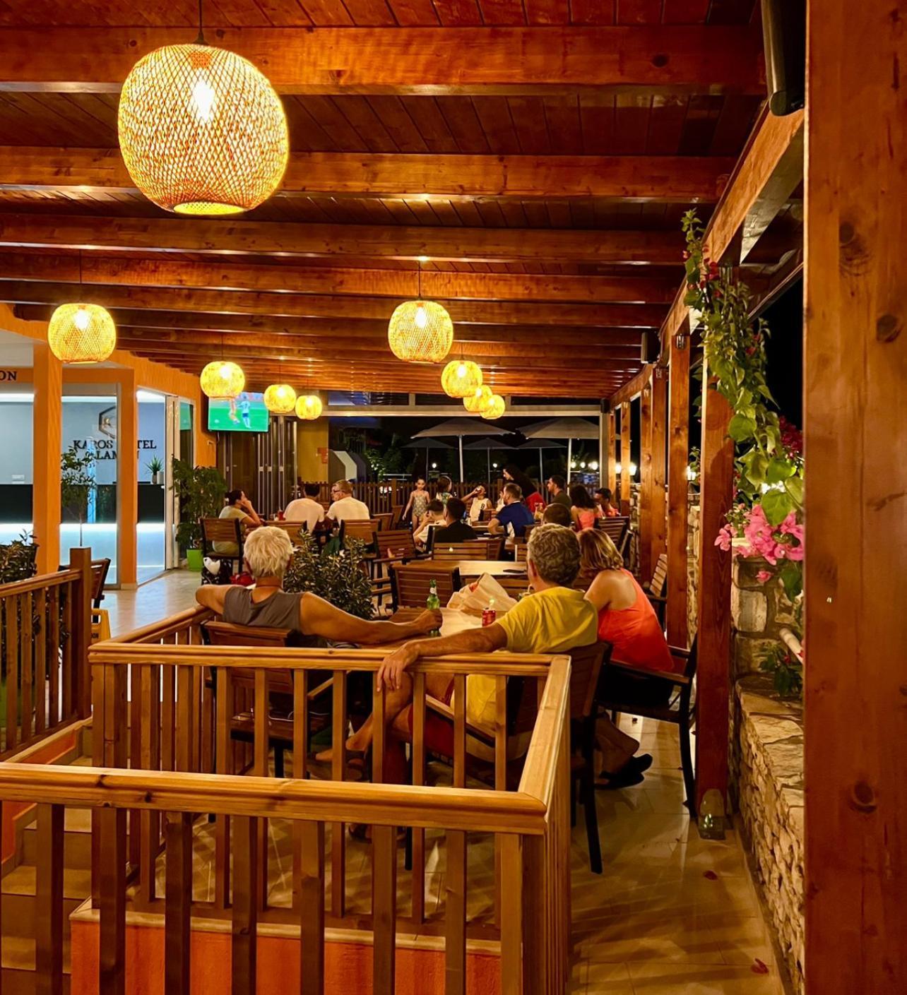 Karos Hotel Llaman Himare Bagian luar foto